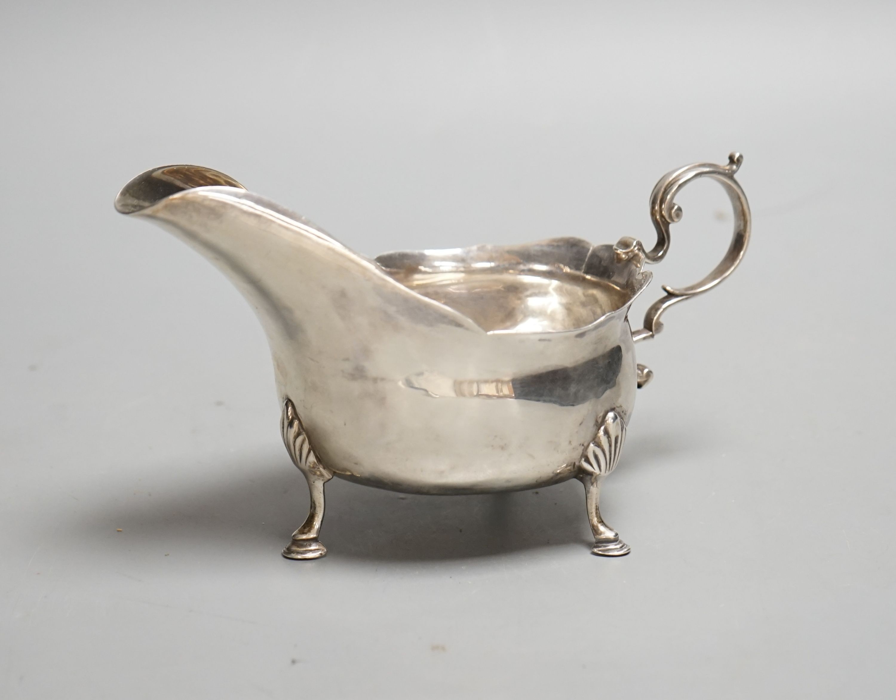 A George III provincial silver sauceboat by John Langlands, Newcastle, 1774, length 15.8cm